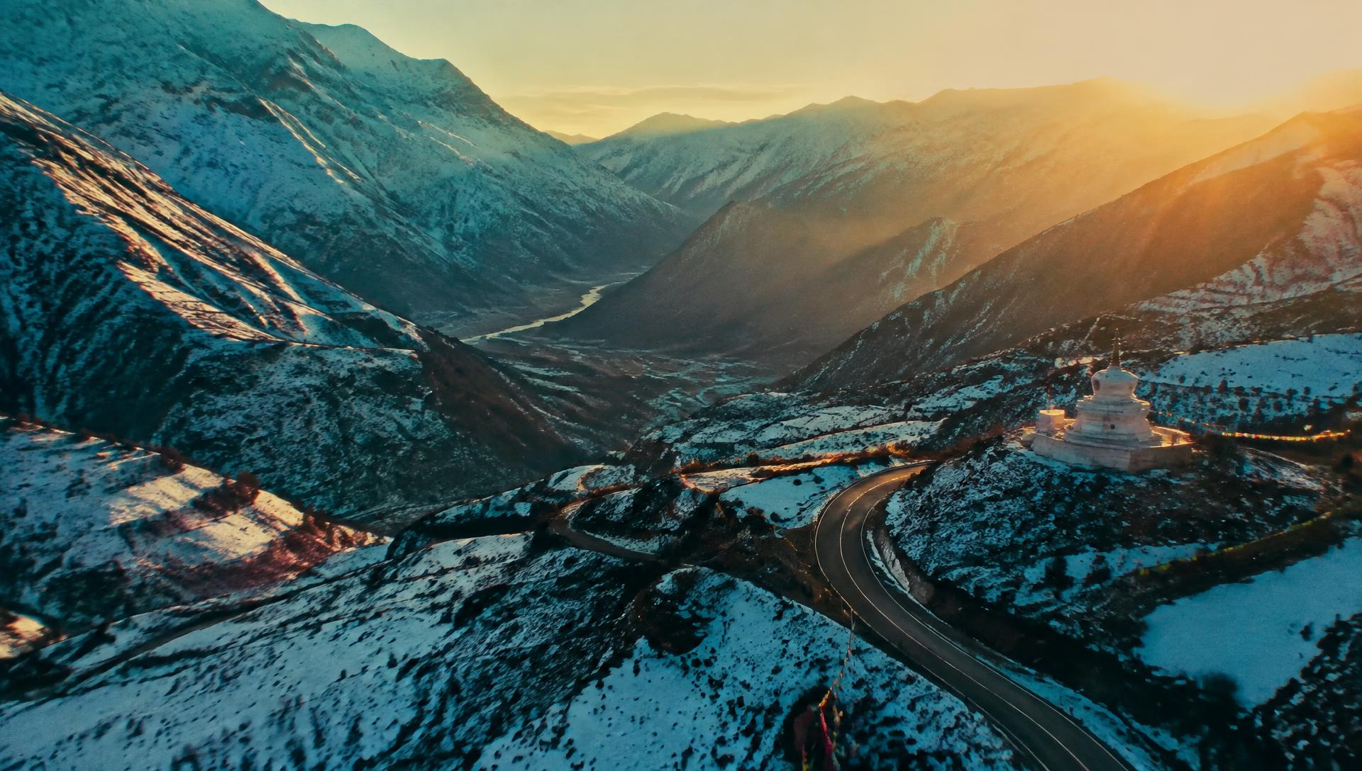 Winding road through a Himalayan valley